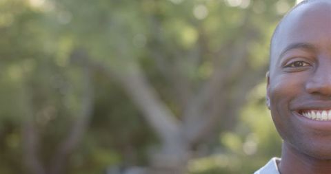 Smiling Man in Nature Embracing Sunshine and Joy - Download Free Stock Images Pikwizard.com