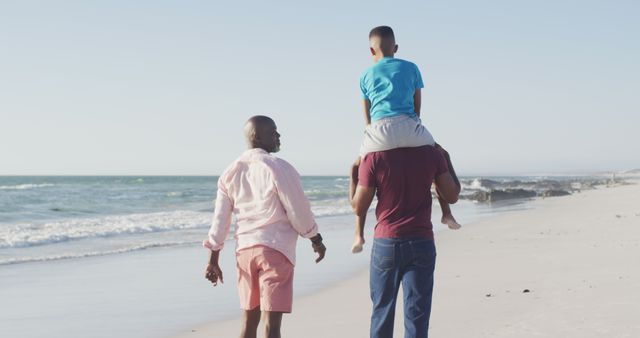 Family Enjoying Beach Walk During Summer Day - Download Free Stock Images Pikwizard.com