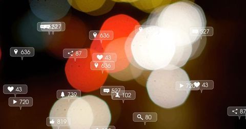 Social media engagement icons floating over bokeh night lights for digital marketing