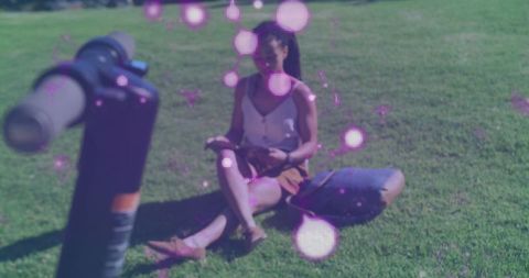 Woman Enjoying Outdoor Reading with Digital Overlay and Telescope