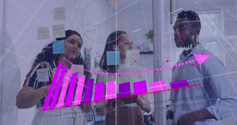 Team Analyzing Business Strategy through Data Visualization on Transparent Board