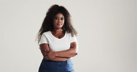Confident African American Woman Posing with Arms Crossed