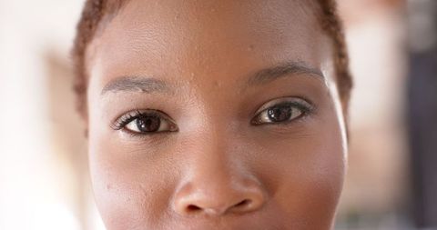 Serene African American Woman Focuses Intently - Download Free Stock Images Pikwizard.com