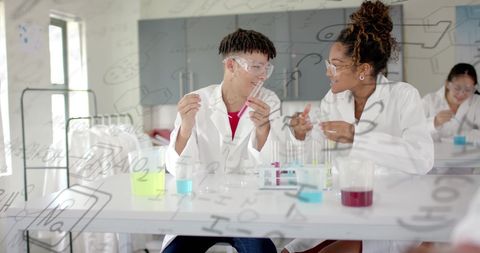 Diverse students engaging in laboratory science experiment