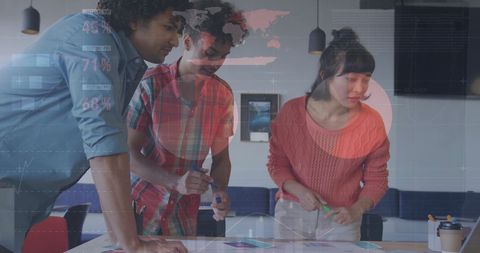 Collaborative Team Analyzing Financial Data Visualization