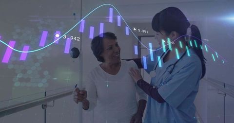 Nurse assisting patient with rehabilitation progress graphs