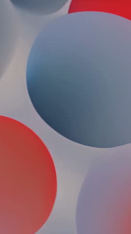 Drifting vertical animation of blue and orange spheres blending soft gradients for modern background