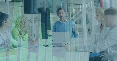 Diverse team discusses financial strategy in modern office