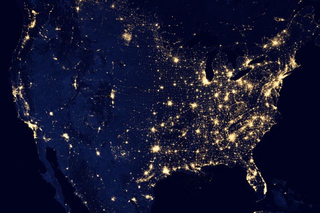 This composite image shows the United States of America illuminated by city lights and other artificial sources at night. Captured by the Suomi NPP satellite’s VIIRS instrument between April and October of 2012, it emphasizes human settlement and activity patterns. This type of image is useful for studies on urban growth, energy consumption, and habitat fragmentation, as well as educational presentations on geographic and environmental topics.