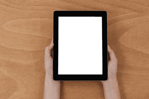 hands holding digital tablet with transparent screen on wood background - Download Free Stock Videos Pikwizard.com