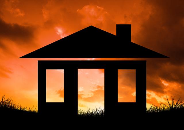 This striking silhouette image features the outline of a home set against a vibrant sunset sky. The house icon is positioned on a grassy landscape. Suitable for real estate advertisements, home insurance marketing, or as a metaphor for dreams and ambitions.
