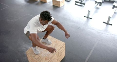african american man performs step-up exercise for strength and agility - Download Free Stock Images Pikwizard.com