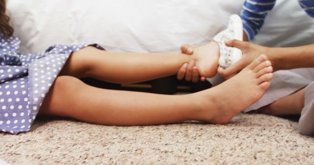 Children playing dress-up with shoes on bedroom floor - Download Free Stock Images Pikwizard.com