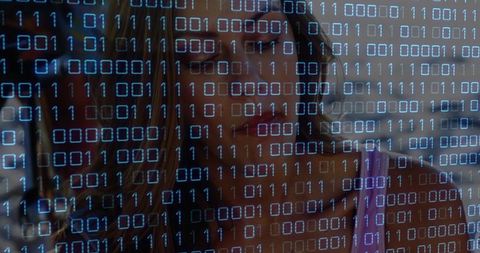 Business Woman Exploring Binary Code with Digital Interface