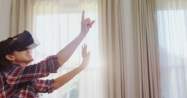 Excited Woman Experiencing Virtual Reality at Home - Download Free Stock Images Pikwizard.com