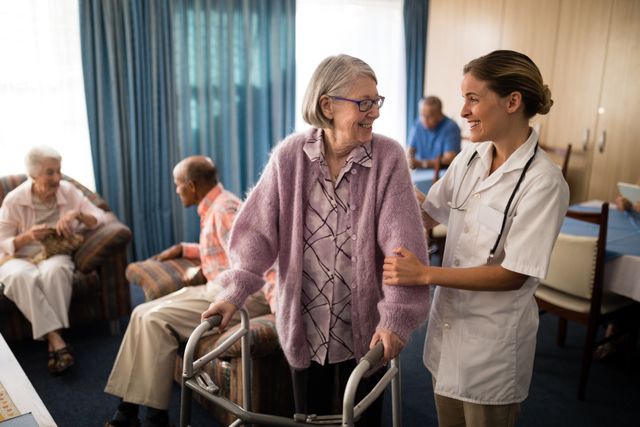 Nurse assisting elderly woman with walker in retirement home. Ideal for use in healthcare, senior care, and retirement living promotions. Highlights compassion, support, and professional caregiving in a senior living environment.