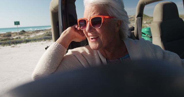 Senior Woman Enjoying Beach Road Trip with Convertibile Car - Download Free Stock Images Pikwizard.com