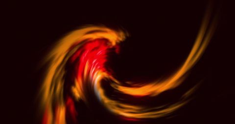 Vivid abstract red swirl on deep black background