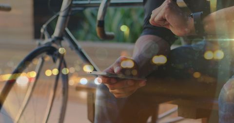Cyclist Using Smartphone Amid Urban Backdrop Imagery