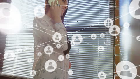 Businesswoman Connecting with Network through Smartphone