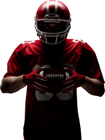transparent american football player holding ball in low light - Download Free Stock Videos Pikwizard.com