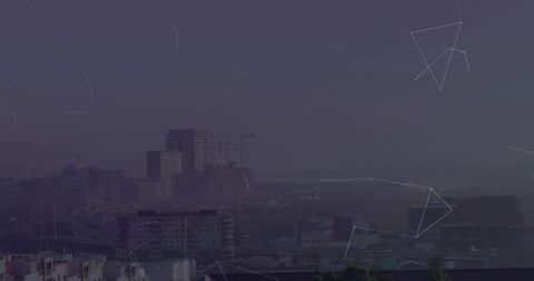 Panoramic city skyline with futuristic network overlay at dusk