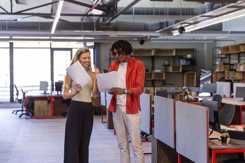 Collaborative meeting in modern open office space