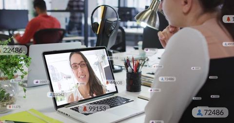 Business Professional Engaging in Virtual Meeting at Modern Office