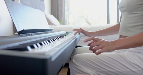 Teen Girl Practicing Piano in Sunlit Room - Download Free Stock Images Pikwizard.com