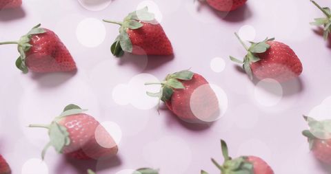 Fresh Strawberries with Light Bokeh Effects