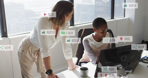 Coworkers Reviewing Digital Feedback and Social Media Interactions
