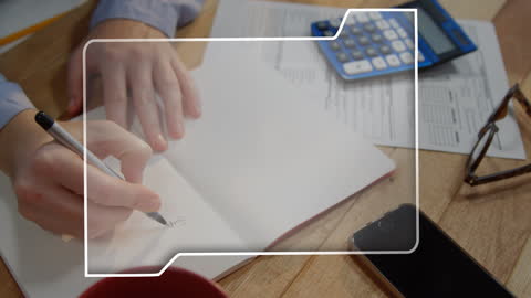 Hands Writing with Financial Documents and Technology Elements