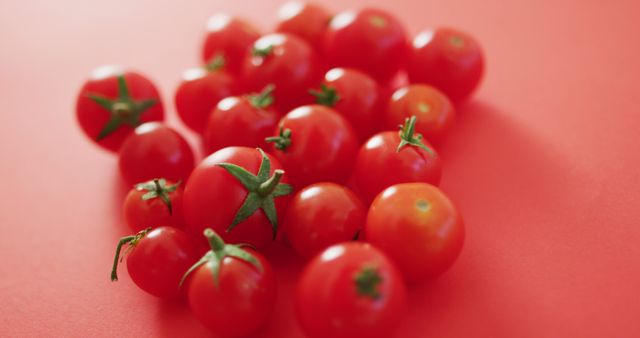 Image of close up of fresh red cherry tomatoes on pink background - Download Free Stock Photos Pikwizard.com