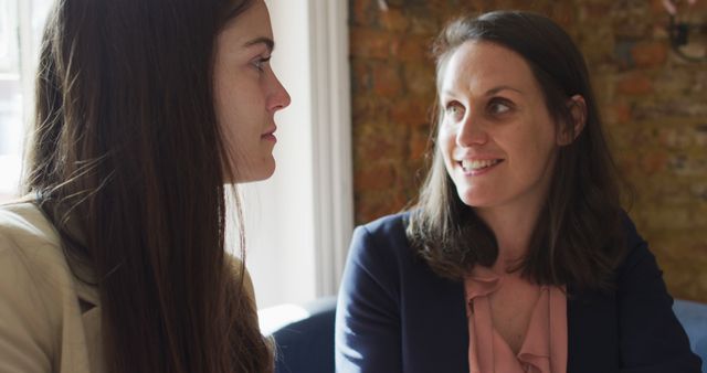 Professional Women Discussing Business in Office - Download Free Stock Images Pikwizard.com