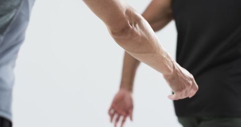 Close-up of Relay Baton Handoff in Competitive Race