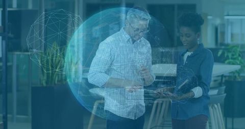 Diverse Professionals Engaging with Holographic Display in Modern Office