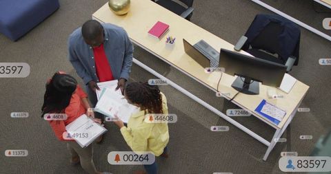 Reviewing Documents Collaborating Around Desk with Data Overlays for Business Analytics