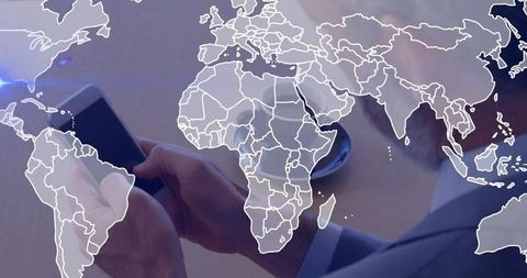 Businessman tapping smartphone with global map overlay connecting mobile workflows