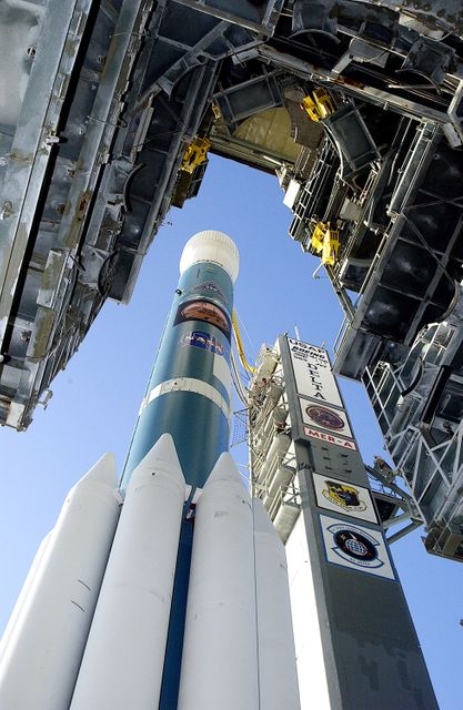 Image shows Boeing Delta II rocket with Mars Exploration Rover-A (MER-A) on launch pad at Kennedy Space Center. Ideal for use in articles about space exploration, NASA missions, Mars exploration programs, and space technology.