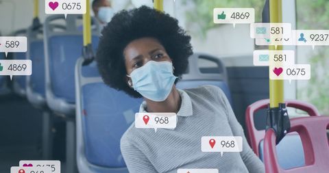 African American Woman with Social Media Icons on Bus
