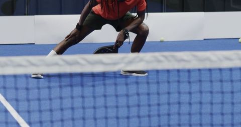 Athletic African American Man Playing Pickleball