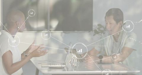 Discussing data across devices in modern boardroom with collaborative analytics dashboard