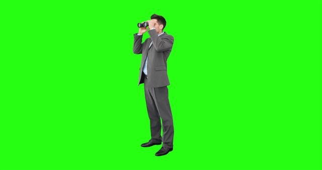 Businessman in Suit Looking Through Binoculars with Green Background - Download Free Stock Images Pikwizard.com