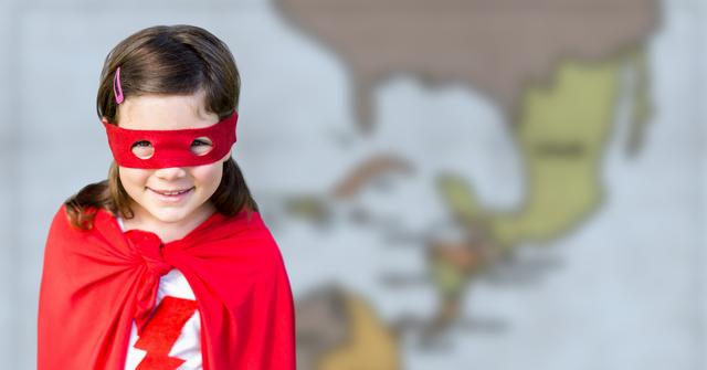 Young Girl in Superhero Costume Posing Confidently in Front of Map - Download Free Stock Photos Pikwizard.com
