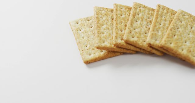 Close-Up of Wheat Crackers on White Background - Download Free Stock Images Pikwizard.com