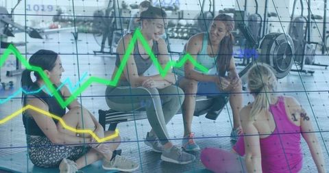 Diverse women discussing fitness goals with data chart overlay