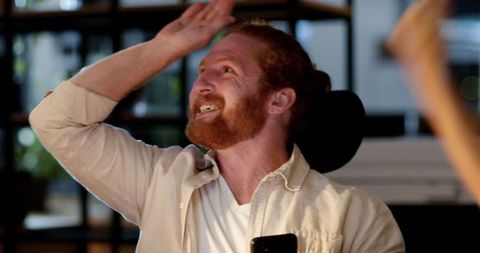 Joyful Professional Celebrating Milestone in Modern Office Environment