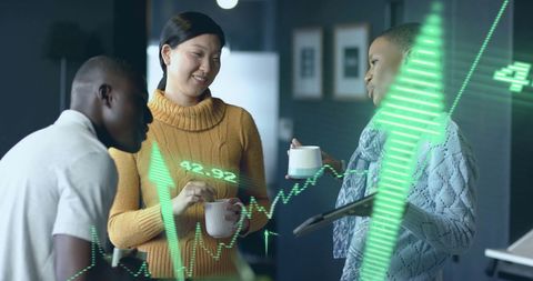 Diverse Team Discussing Financial Data in Office