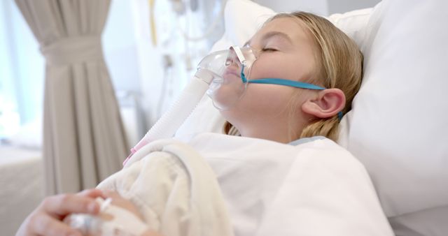 Young Girl Receiving Oxygen Therapy in Hospital Bed - Download Free Stock Images Pikwizard.com