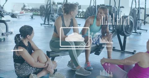 Diverse Women Discussing with Digital Overlay at Gym
